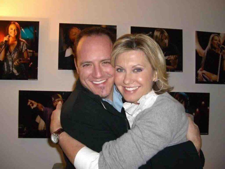 Mike Caprio and Olivia Newton-John